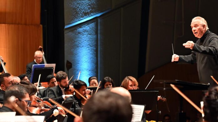 What brought renowned British conductor Sir Mark Elder to India?